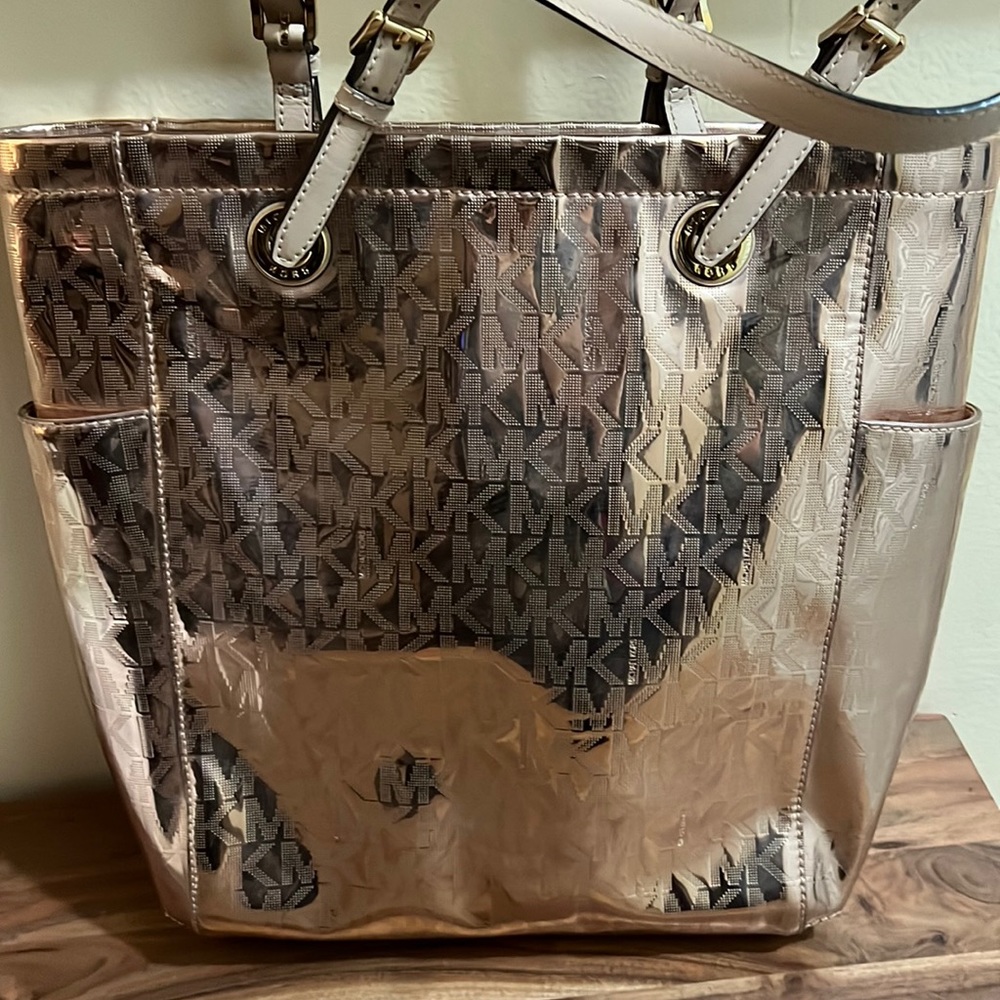 Never used rose gold tone Michael Kors handbag